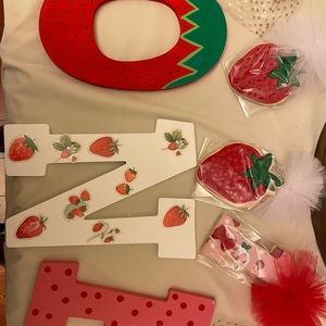 “A Berry Sweet 1st Birthday” party decor.